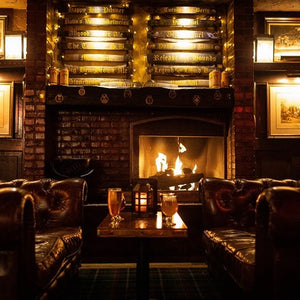 Interior shot of the Bull & Bush looking at the fireplace.